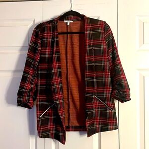 Brand new women's blazer. Size L. Great condition. Black checkered. 3/4th sleeve